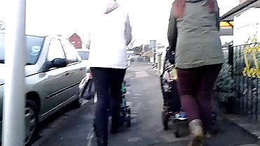 Two hot mums walking down the street