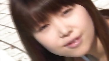 Momoko undresses and shows her hairy cunt